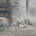 Pri Omišu na požarišču našli truplo, reševalci iščejo tujo državljanko
